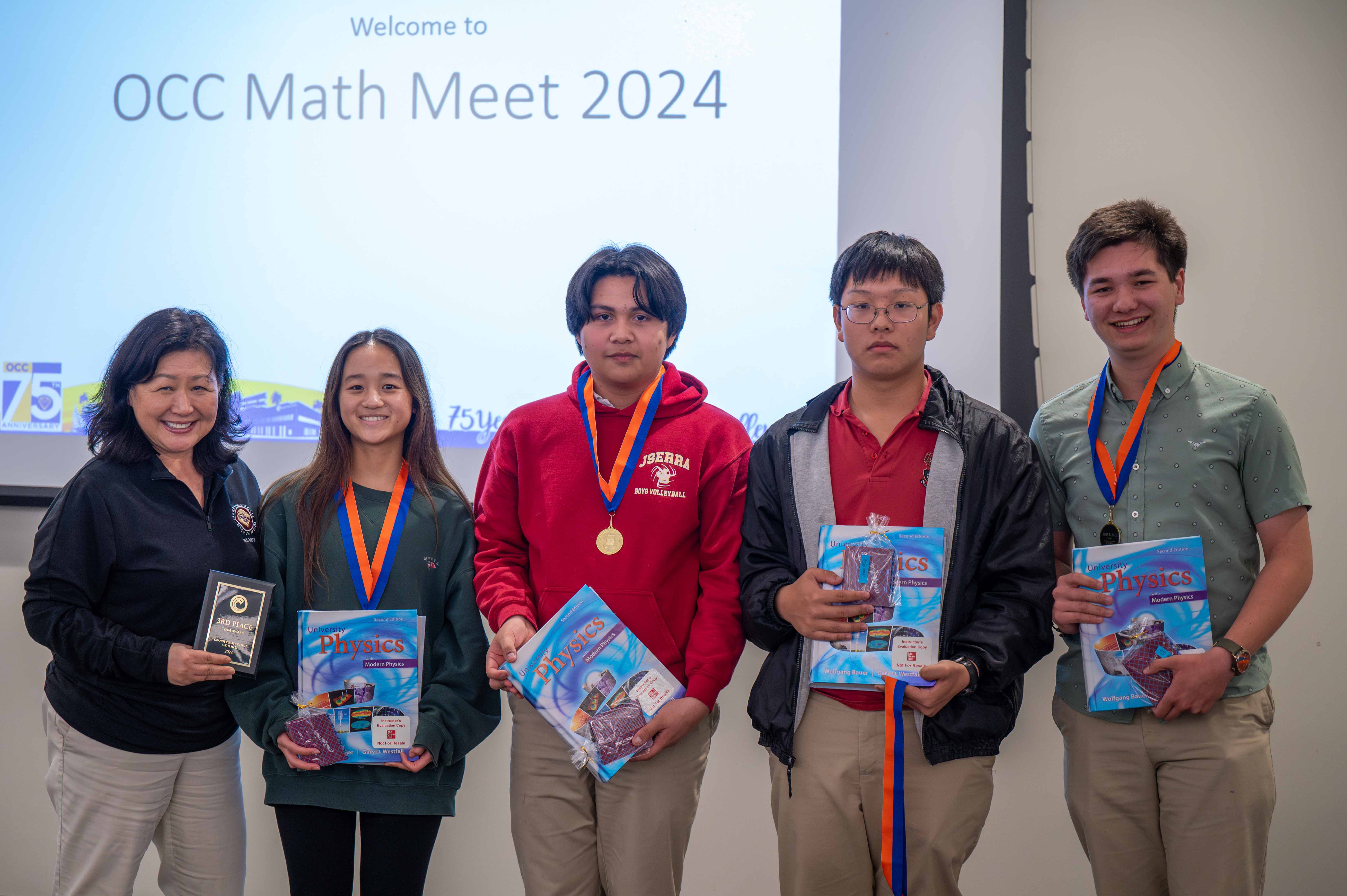 Jserra Catholic High School students receive their plaque and medals for third place at the OCC Math Meet