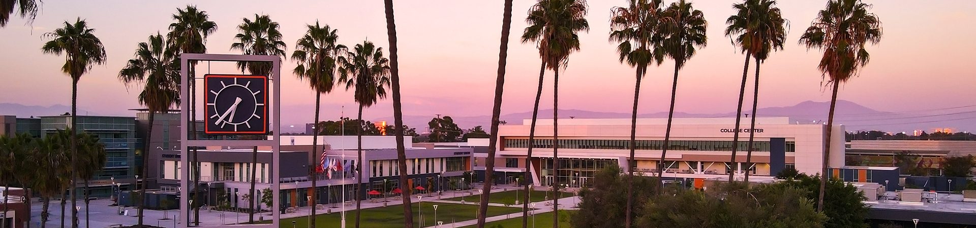 OCC Clock Tower with background of the main quad.