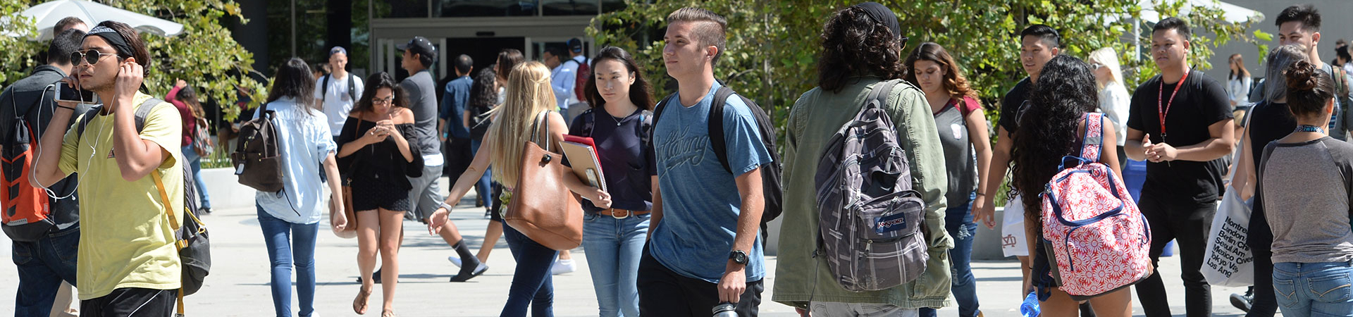 Crowd of students walking in front of MBCC building