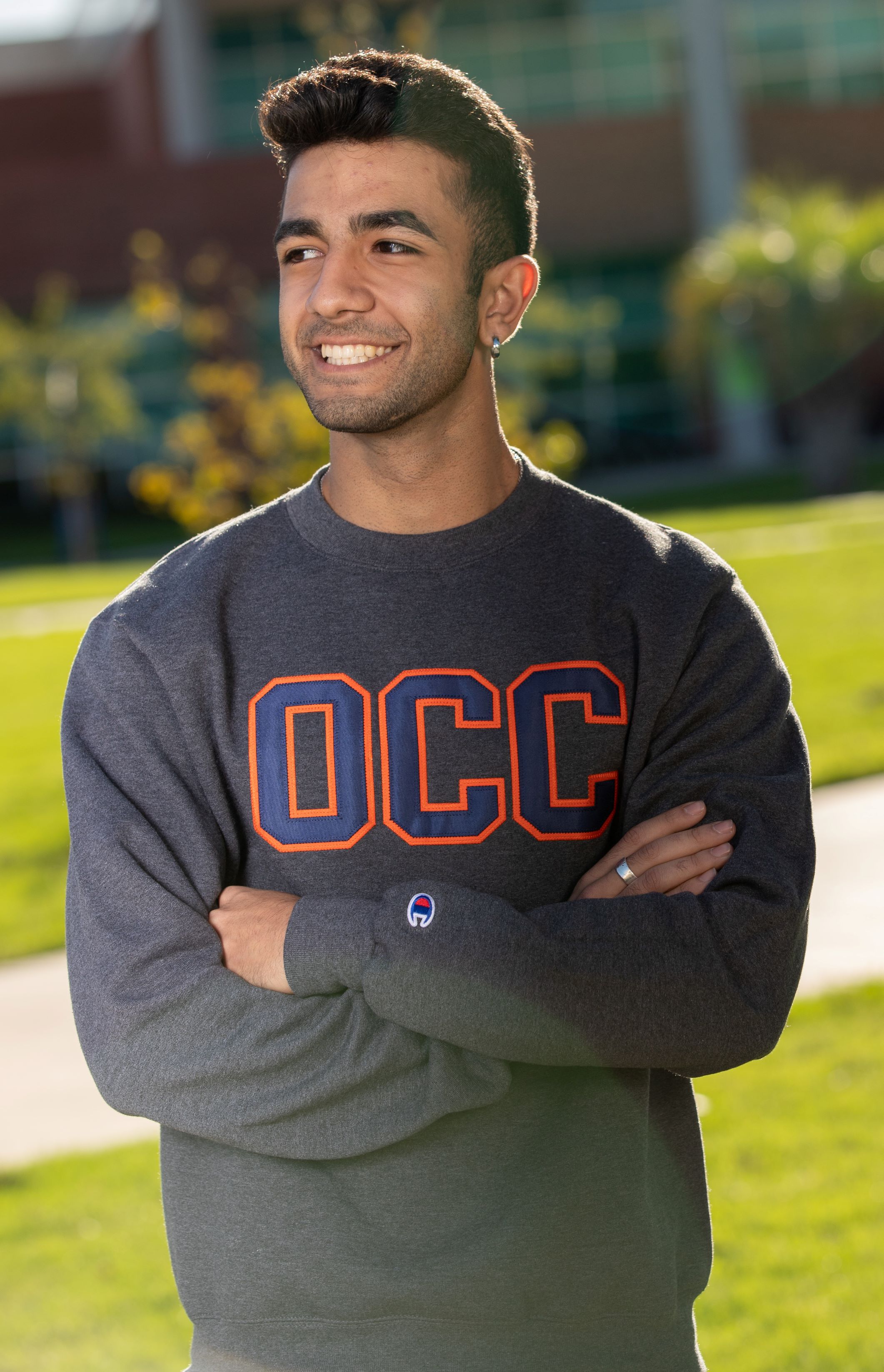 student with occ sweatshirt on